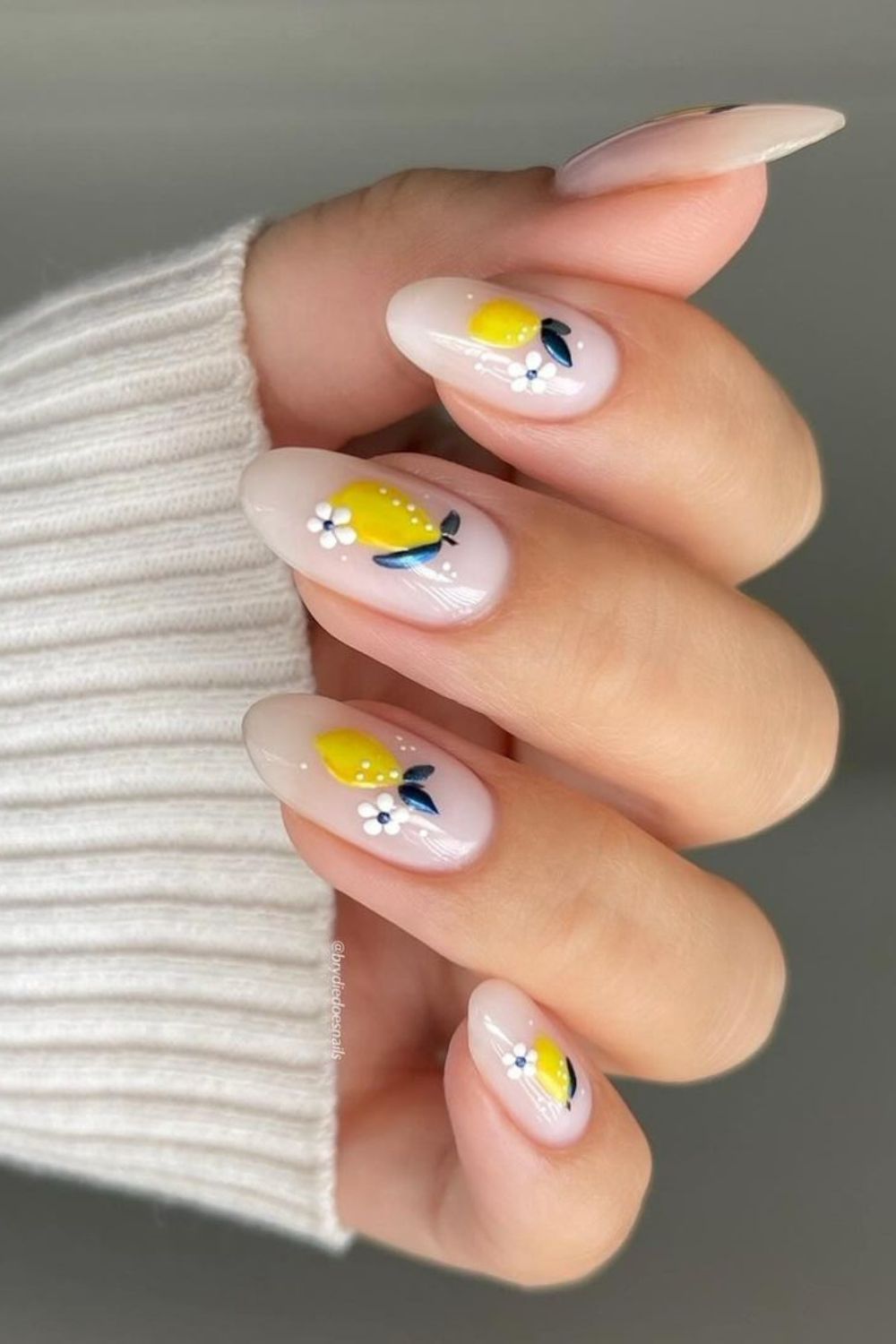 White nails with lemon accents