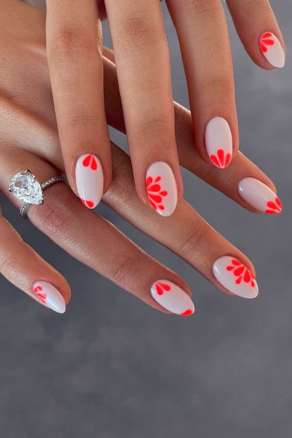 White nails with neon flowers