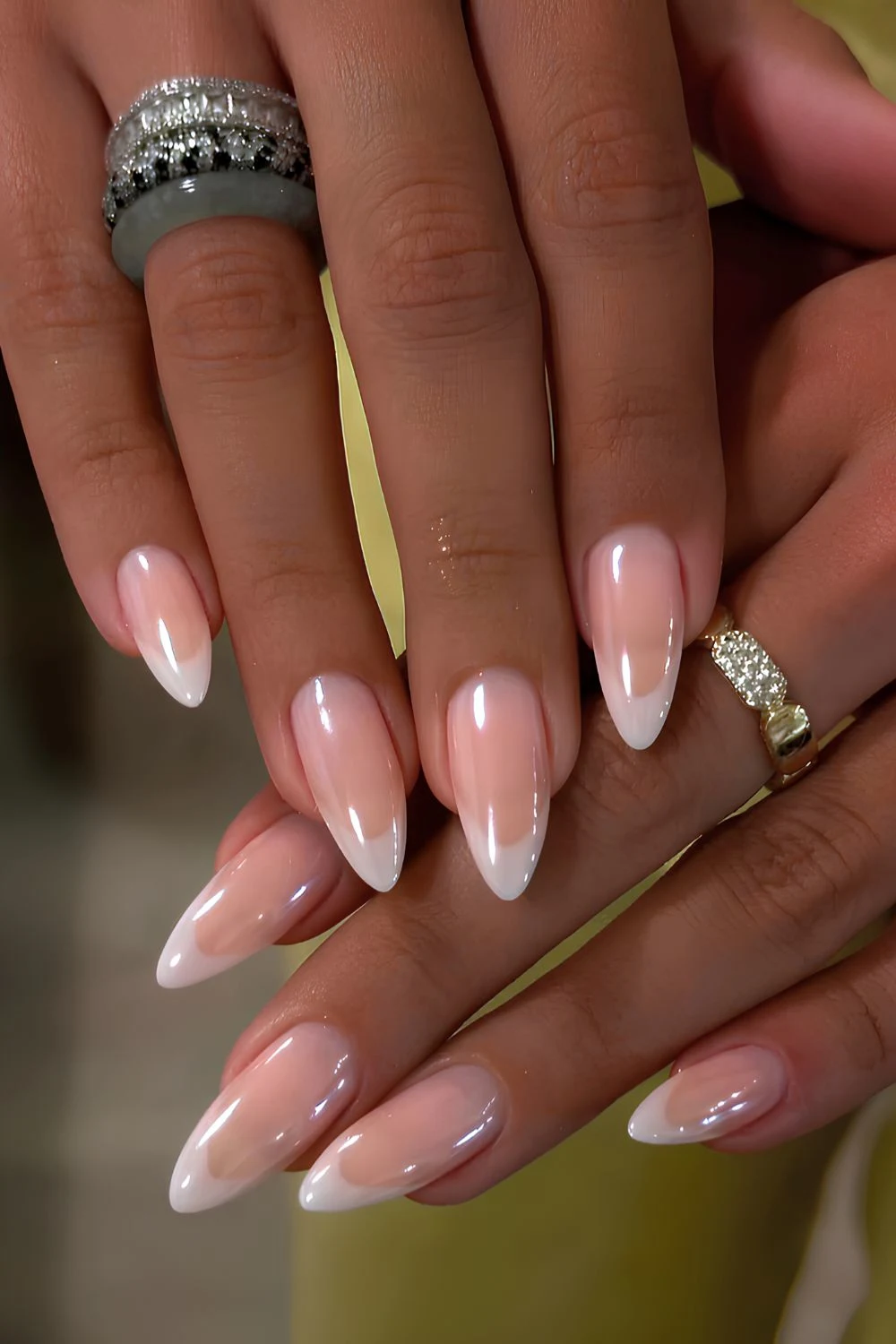Almond shaped white french chrome nails