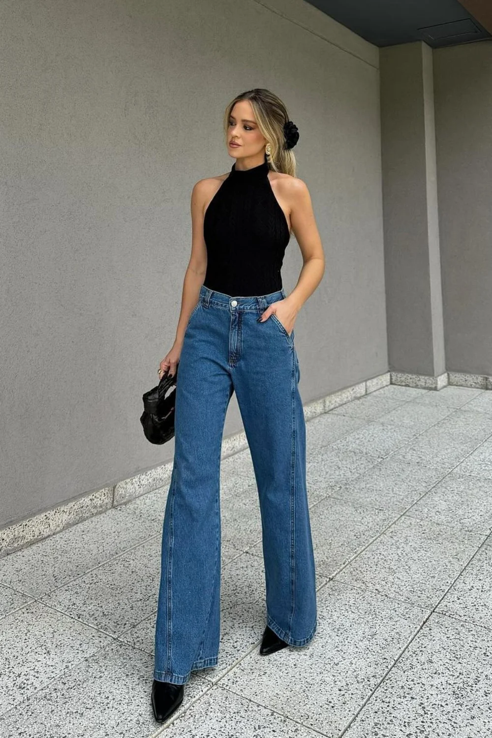 Black Halter Top & High-Waisted Jeans