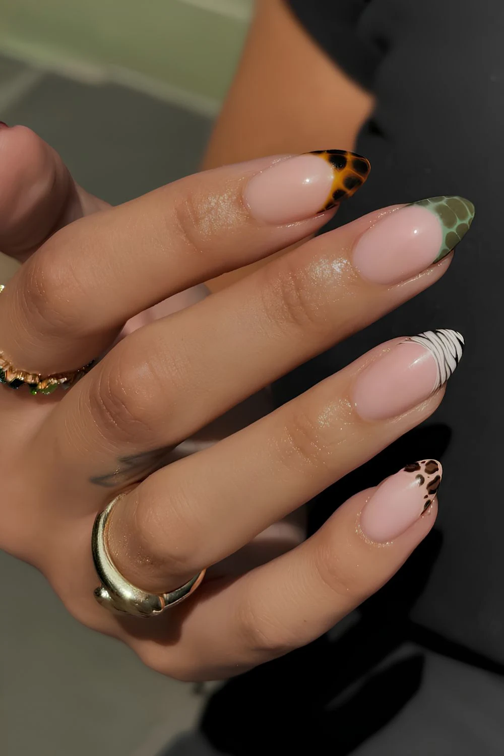 Brown and green animal print French manicure