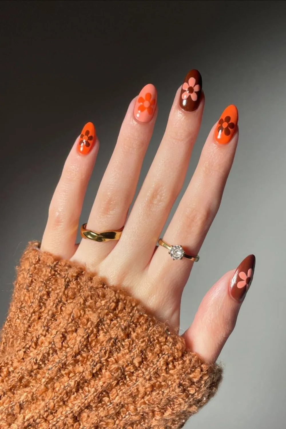 Brown and orange fall nails with retro florals