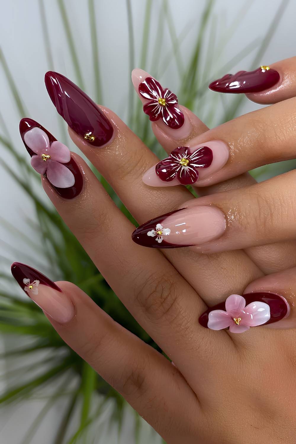 Burgundy nails with 3D floral art
