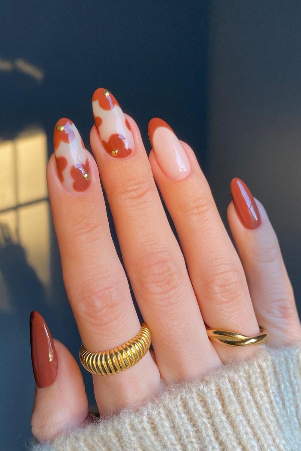 Cinnamon nails with floral accents