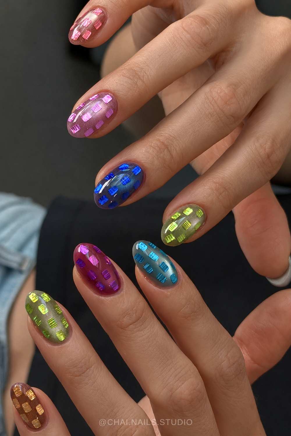 Colorful cat eye mani with confetti accents