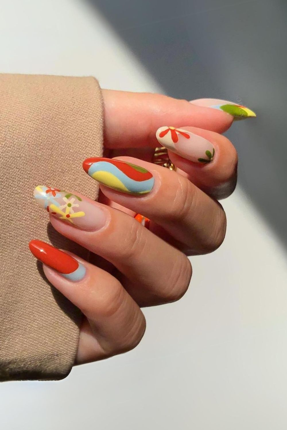 Colorful fall nails with flowers and swirls