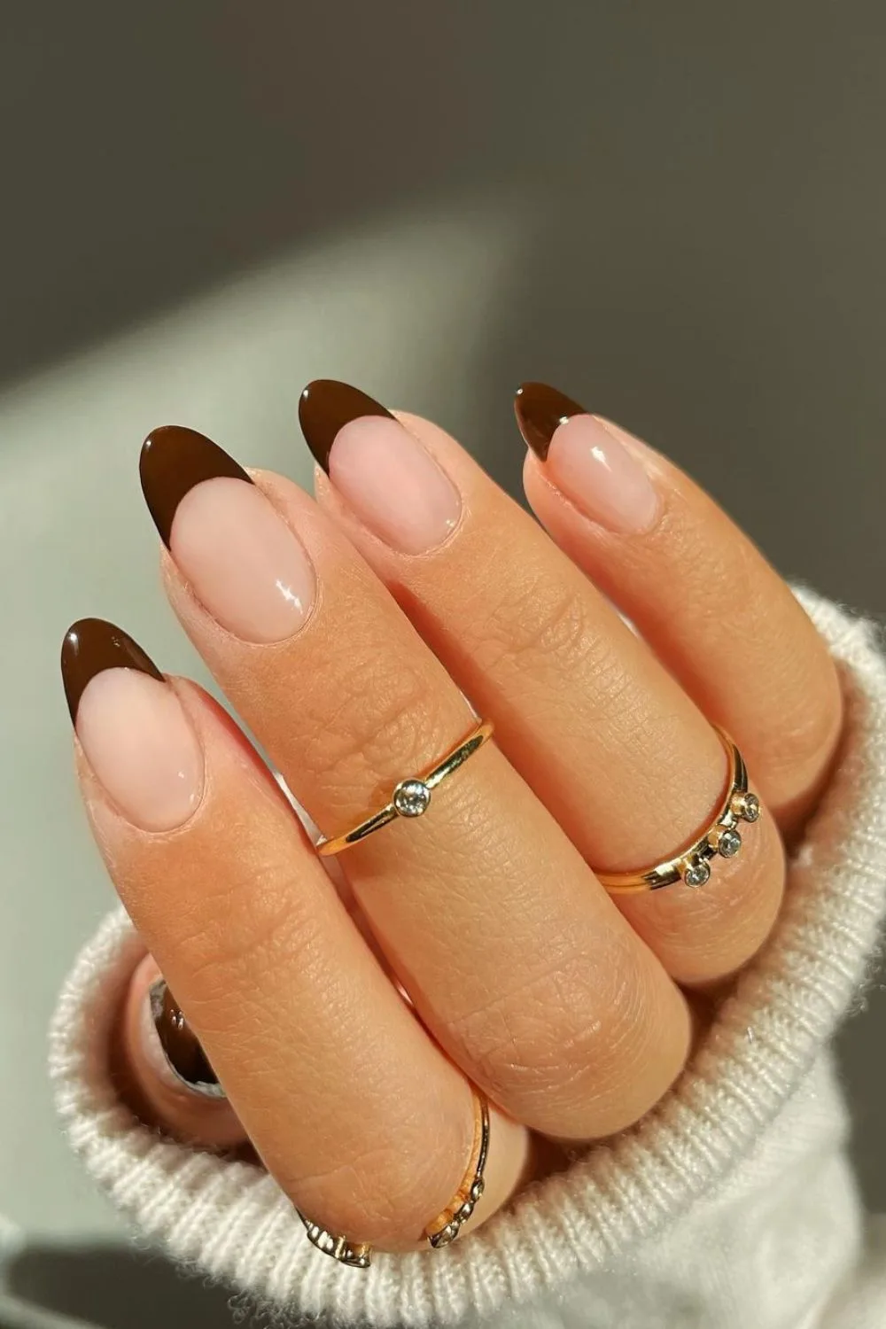 Dark brown french tip nails