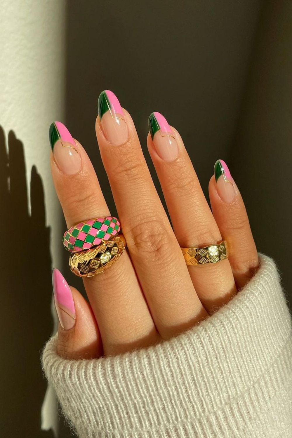 Dark green and pink french tip nails