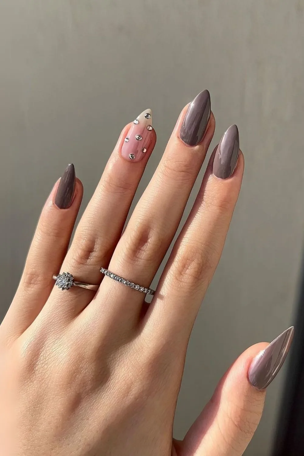 Dove gray nails with rhinestone accents