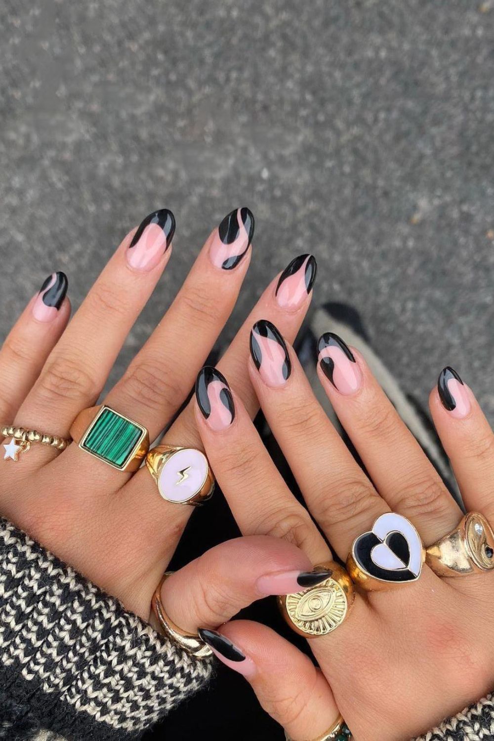 Funky black nails with negative space accent