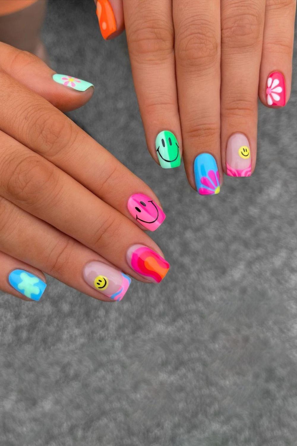 Funky nails with neon smileys and florals