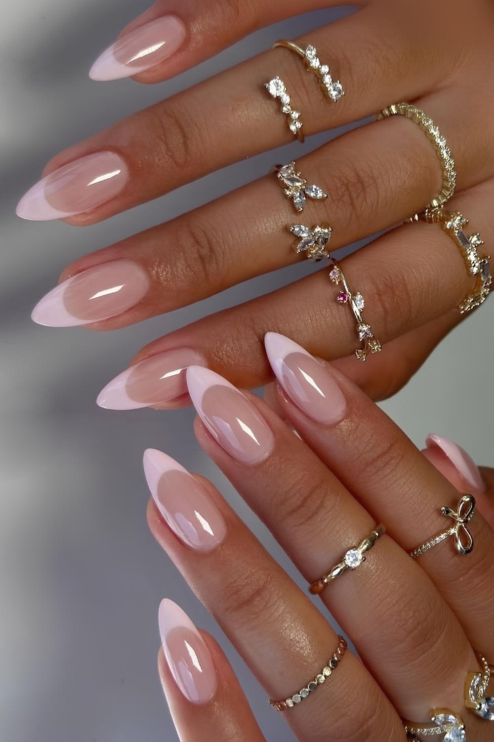 Glossy light pink French nails