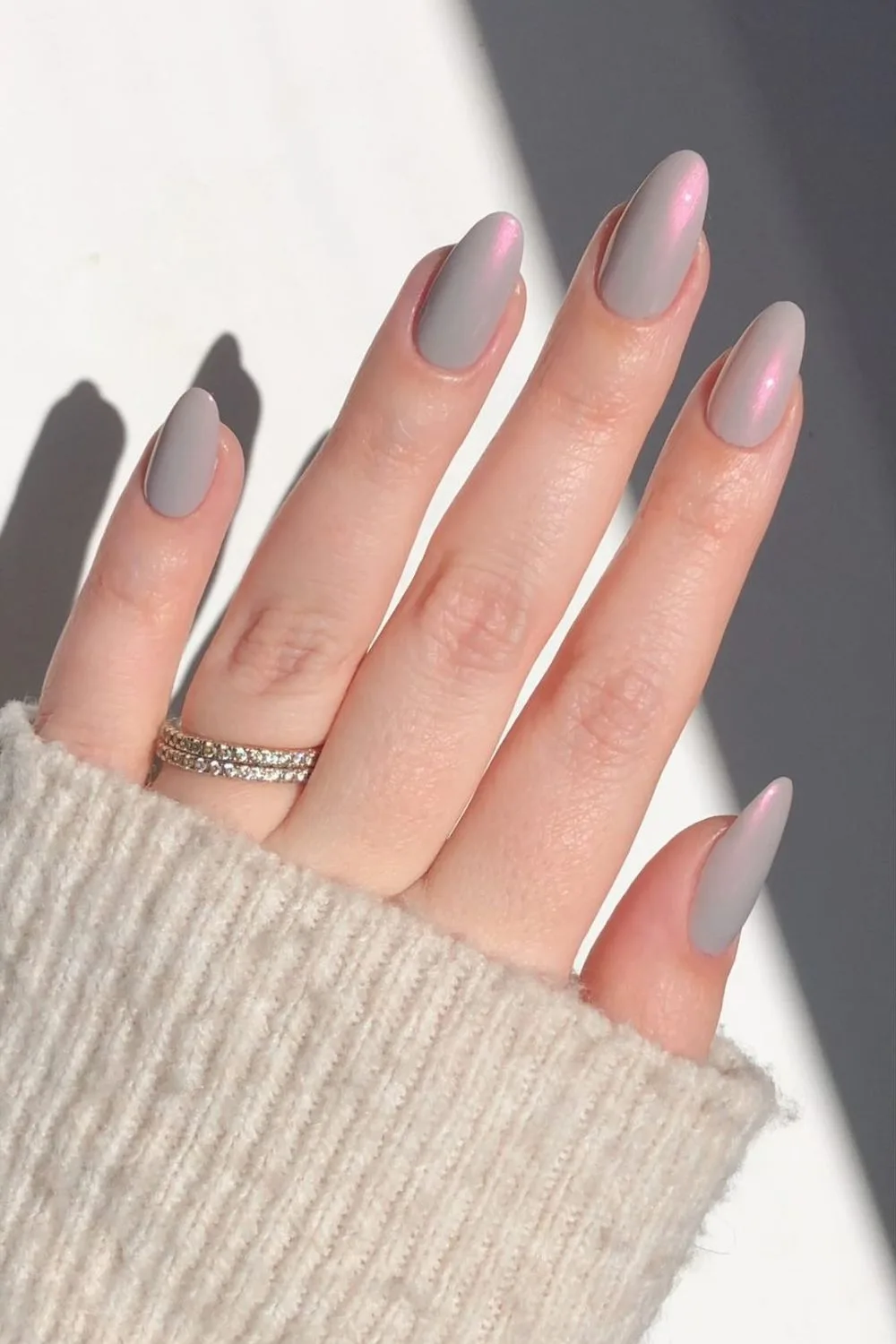 Gray nails with a pink satin finish