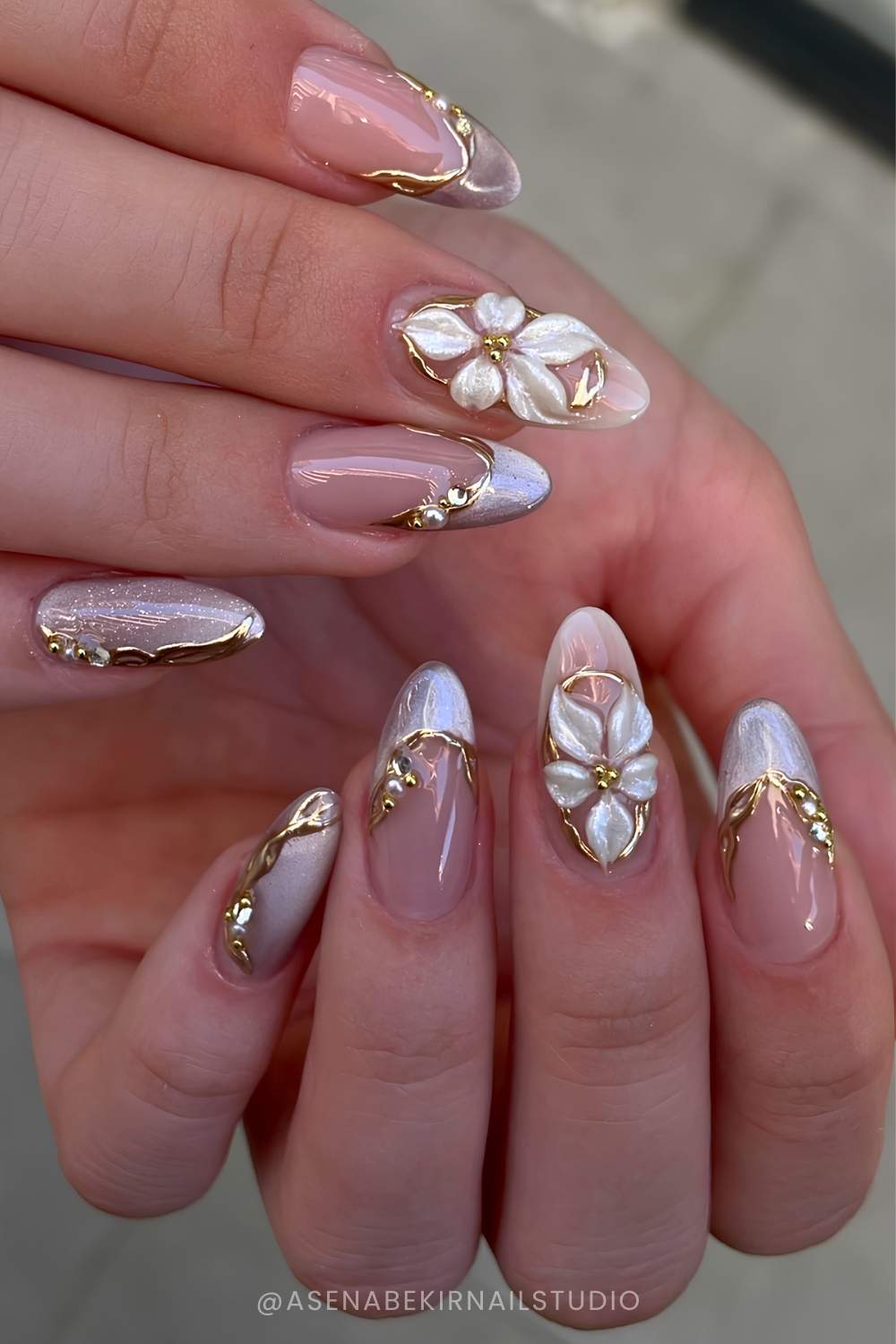 Gray nails with magnetic finish and accent flowers