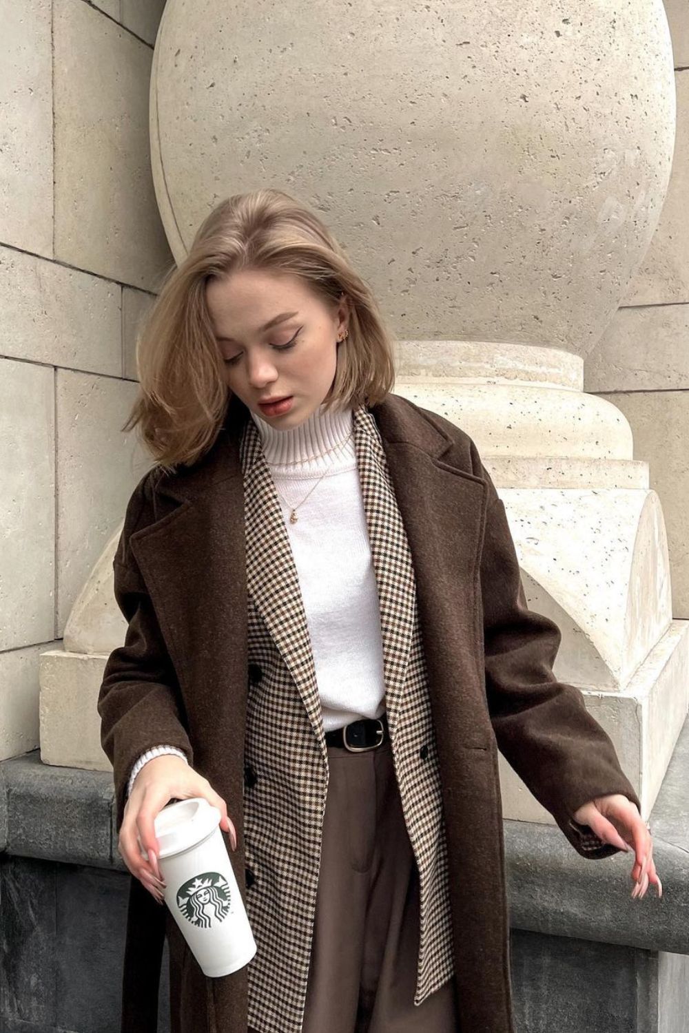 Layered brown coat with houndstooth blazer and turtleneck