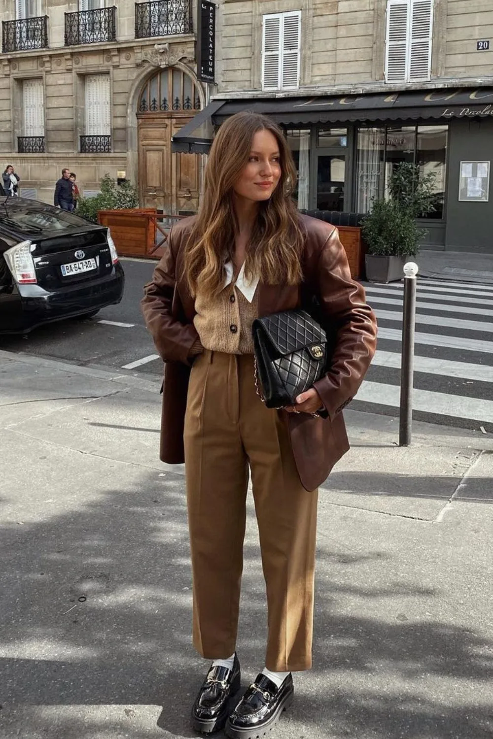 Leather blazer and high-waisted trousers