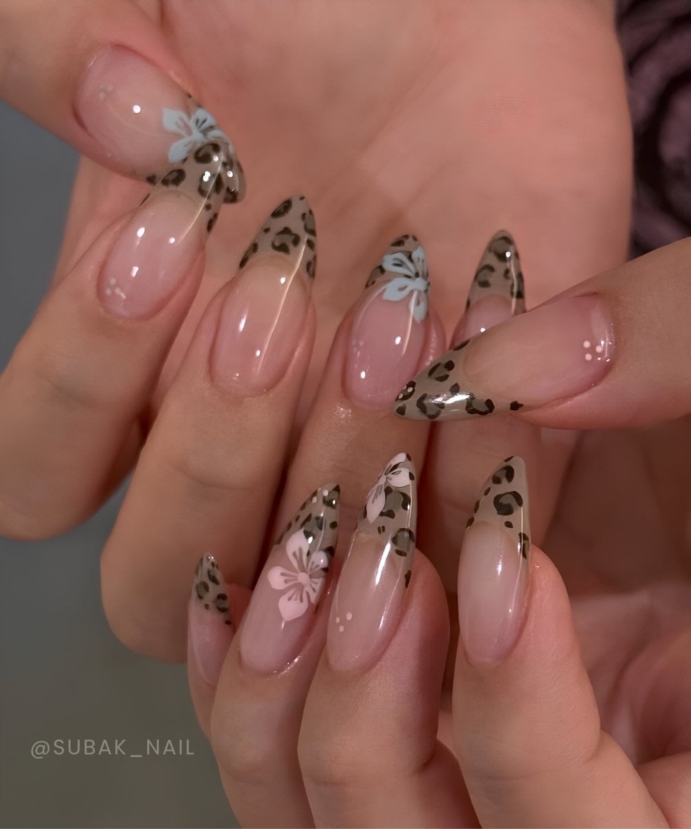 Leopard French nails nails with pink and blue flowers