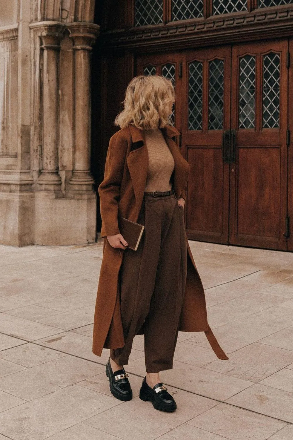 Long brown coat, turtleneck and trousers