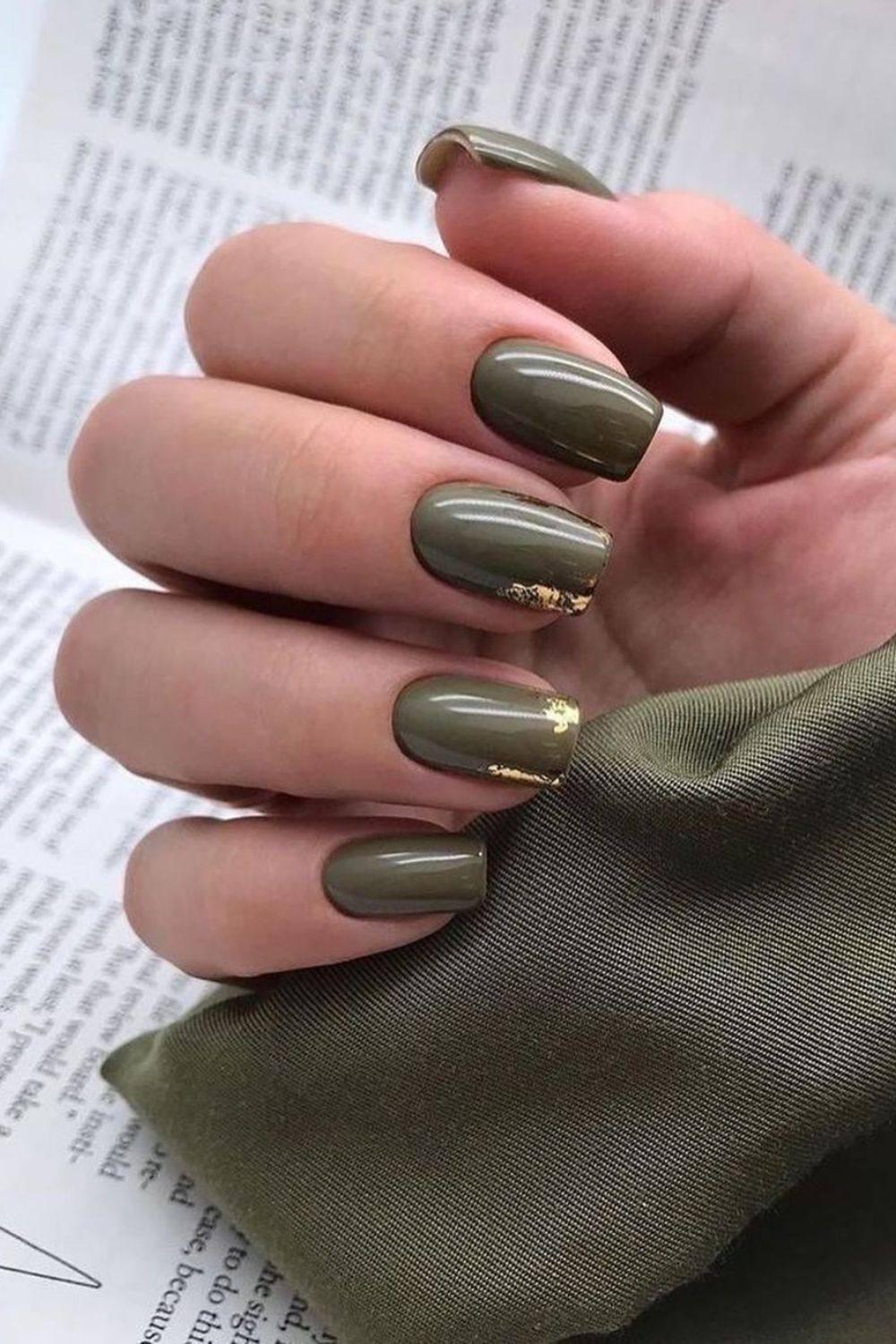 Moss green nails with gold foil accents