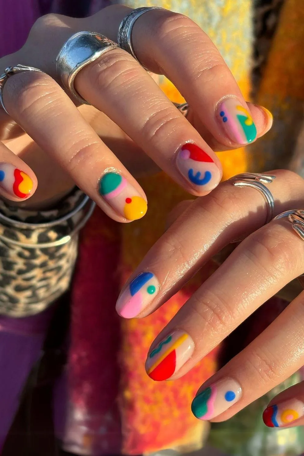 Nails with colorful abstract shapes