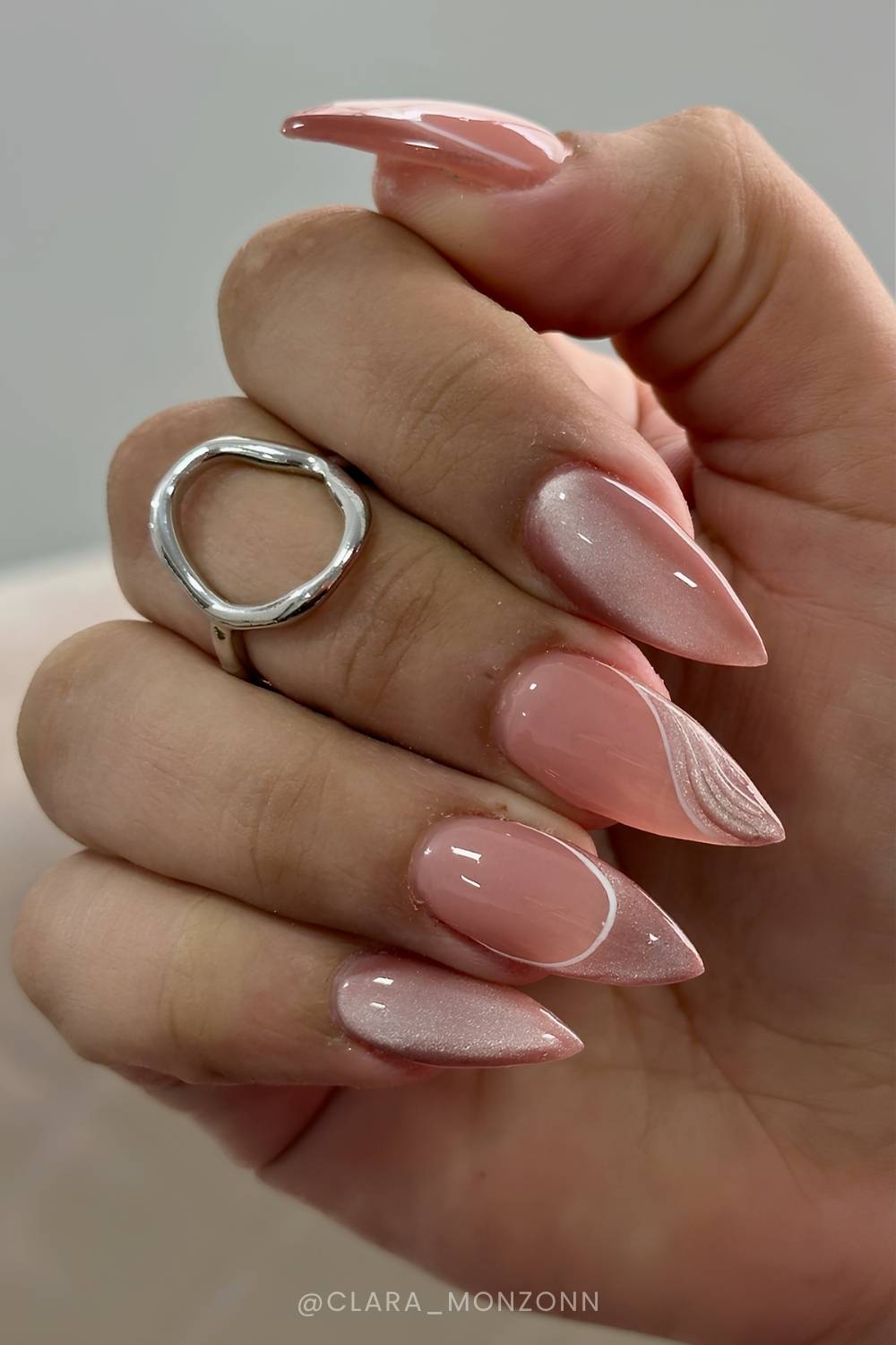 Neutral cat eye mani with negative space details