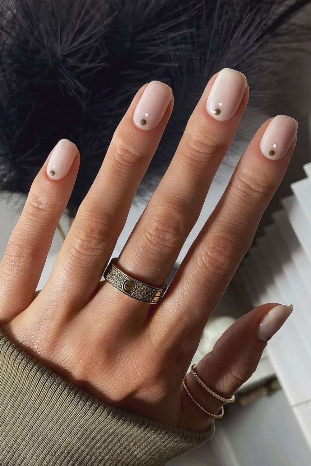 Nude nails with dot accents