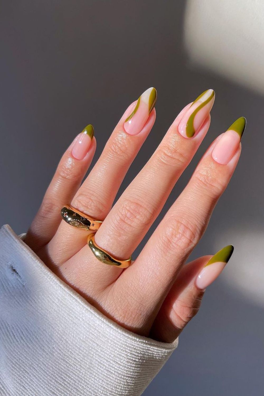 Nude nails with olive green swirls