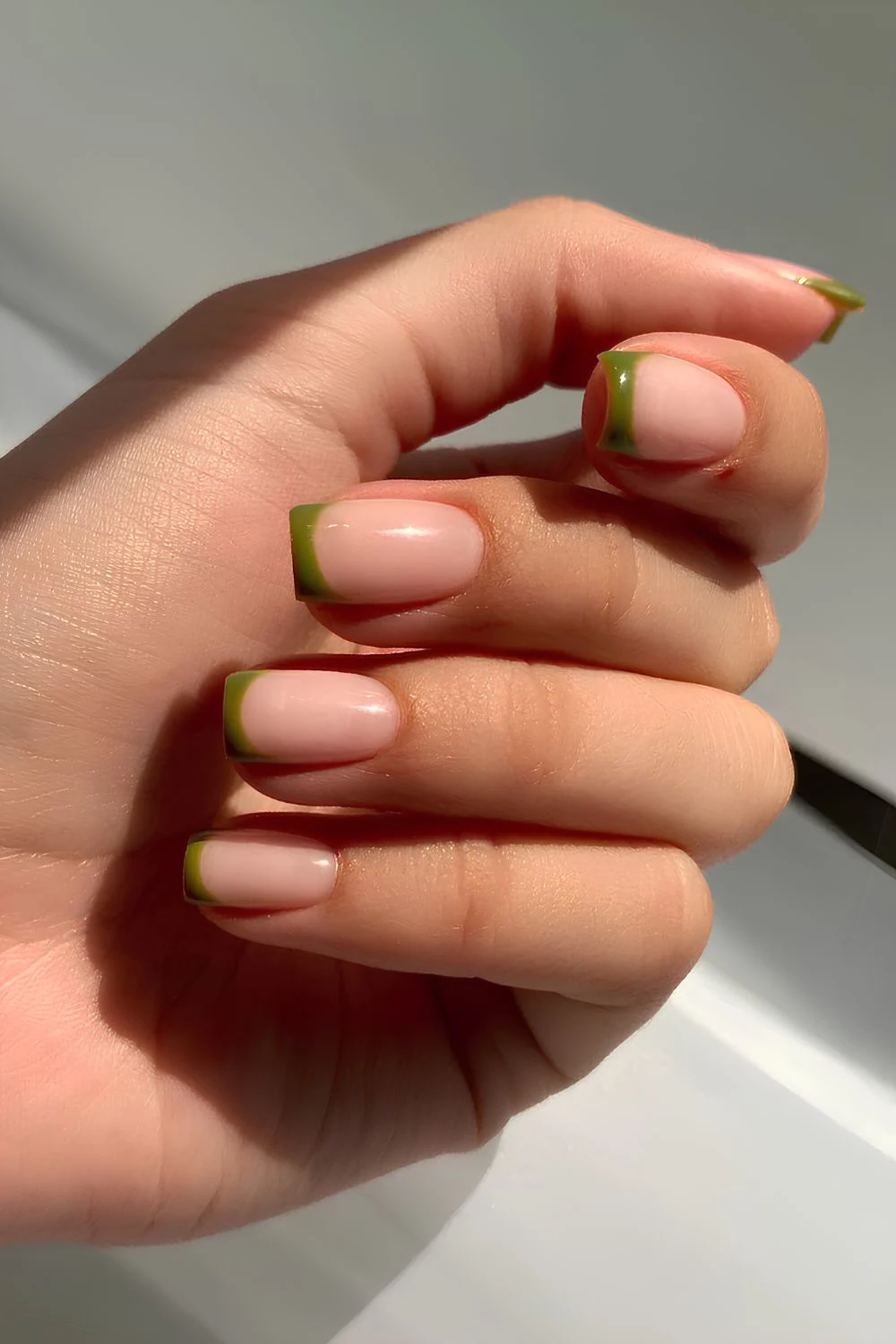 Olive green French tip mani