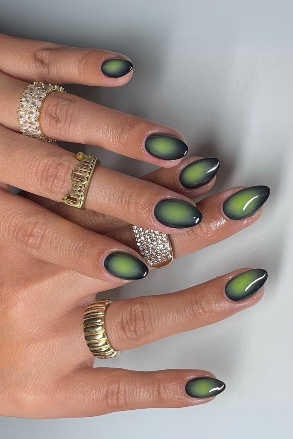 Olive green and black aura nails