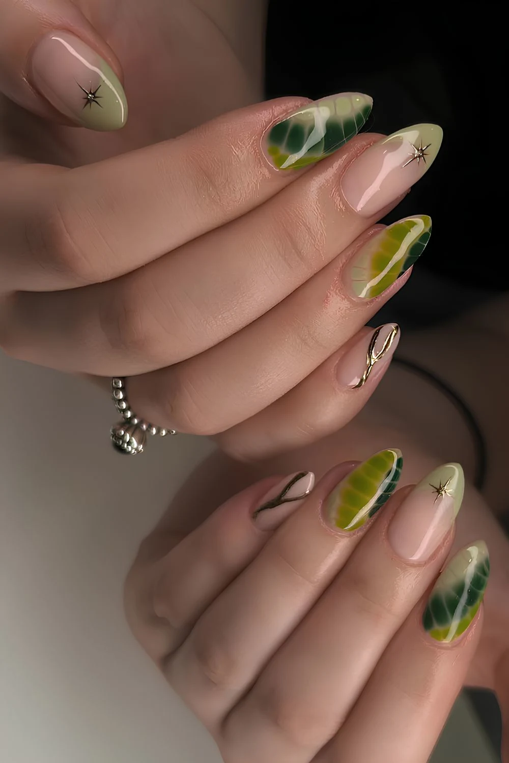Olive green nails with animal pritn accents