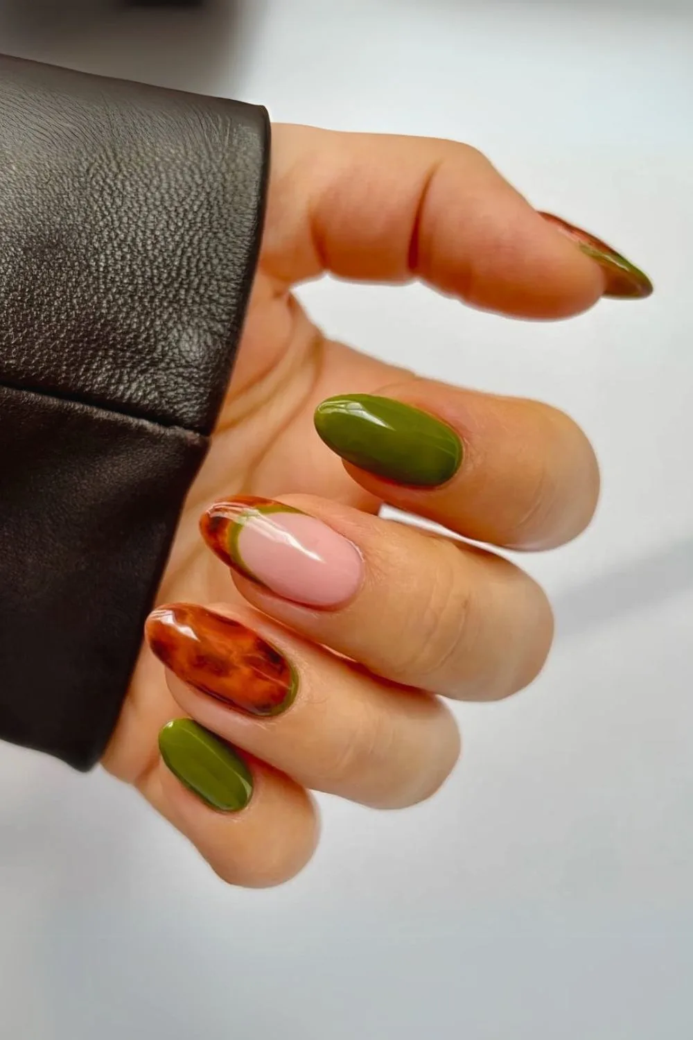 Olive green nails with tortoise shell accent