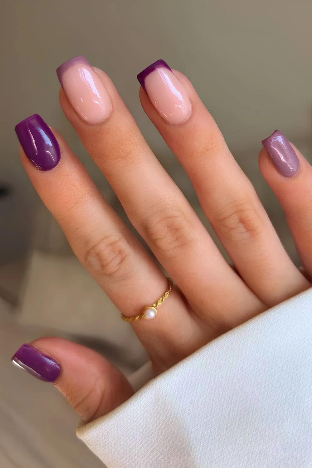 Purple nails with accent French tips