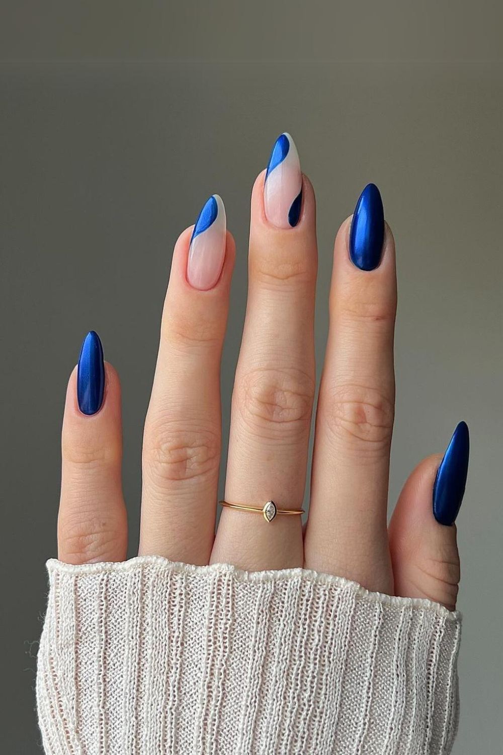 Sapphire blue nails with negative space accent