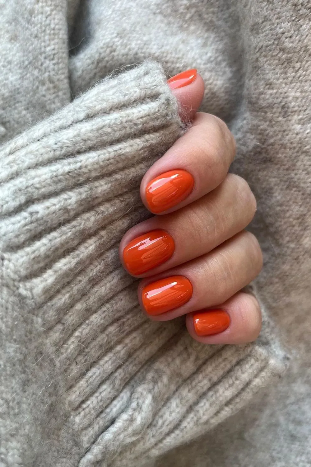 Short burnt orange nails