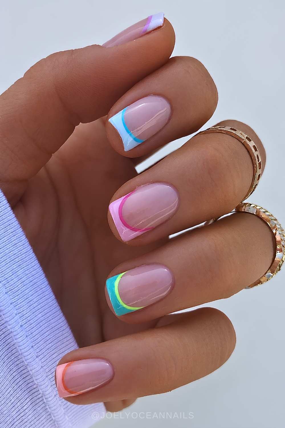 Short colorful outlined French manicure