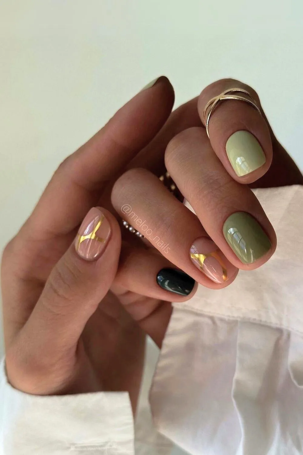 Short green and gold fall nails