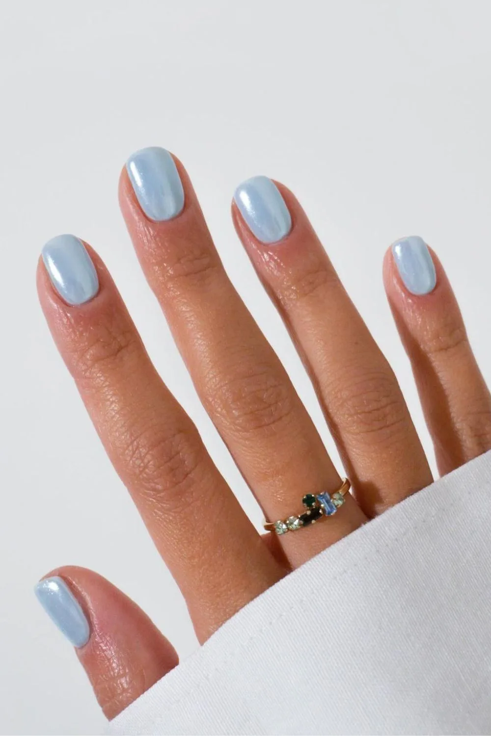 Short light blue chrome nails