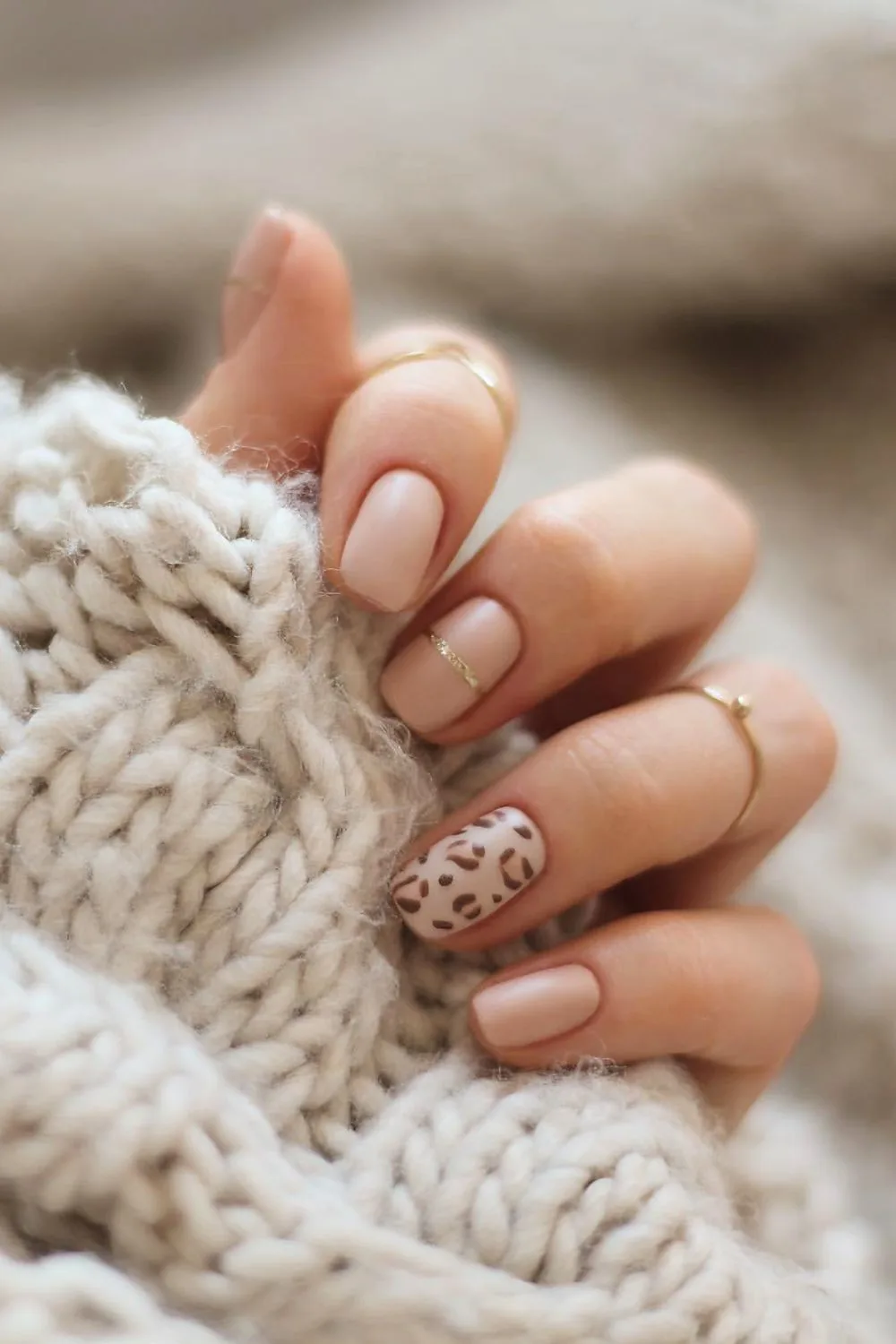 Short neutral leopard nails