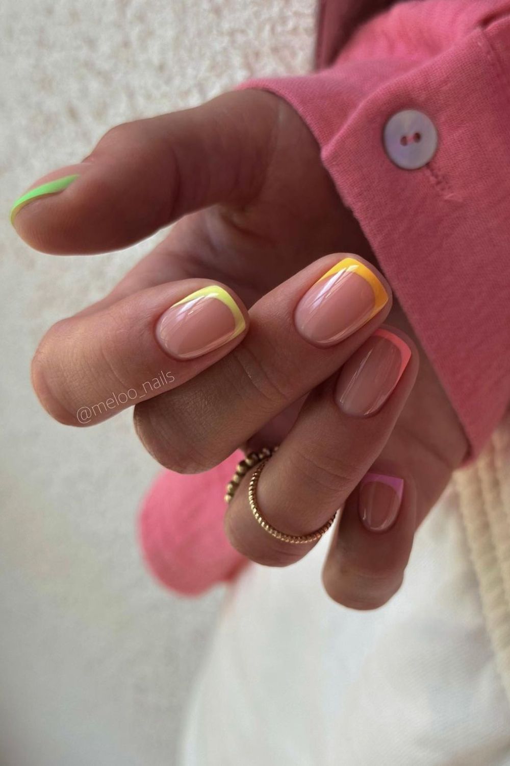 Short skittle french tip nails