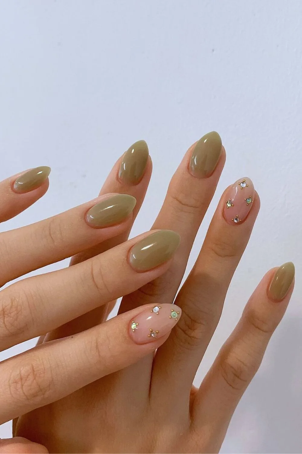 Soft olive nails with rhinestones