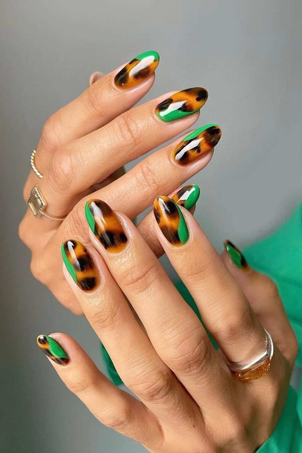 Tortoise sell nails with funky green accents