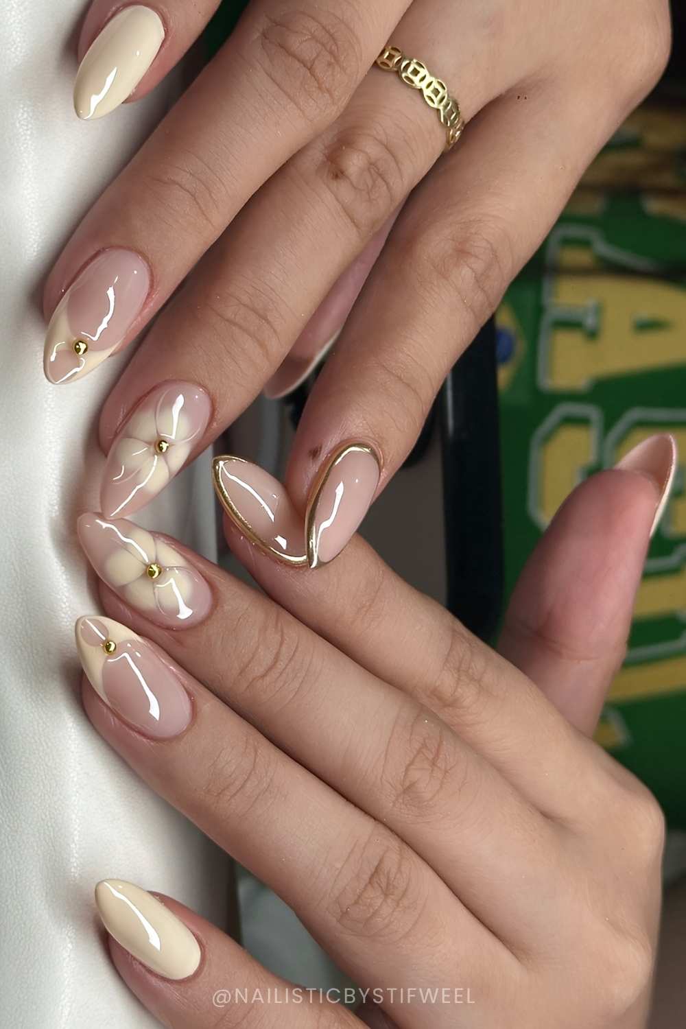 Vanilla manicure with florals and gold outlines