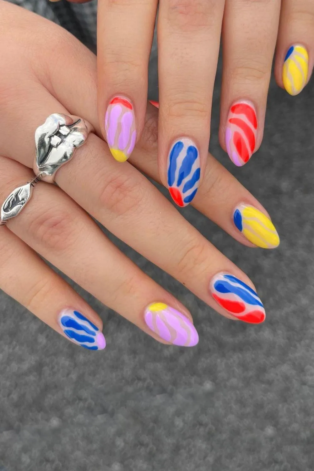 Vibrant nails with abstract floral designs