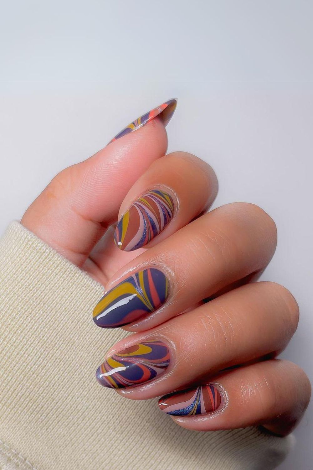 Water marble nails in fall colors