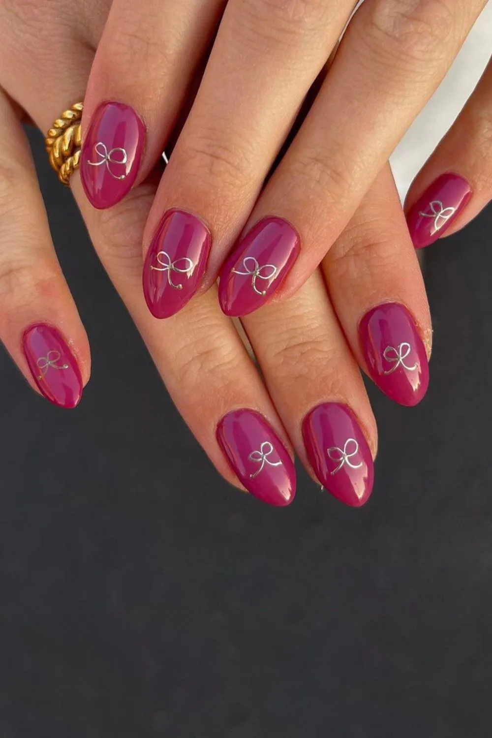 Wine berry nails with bow accents