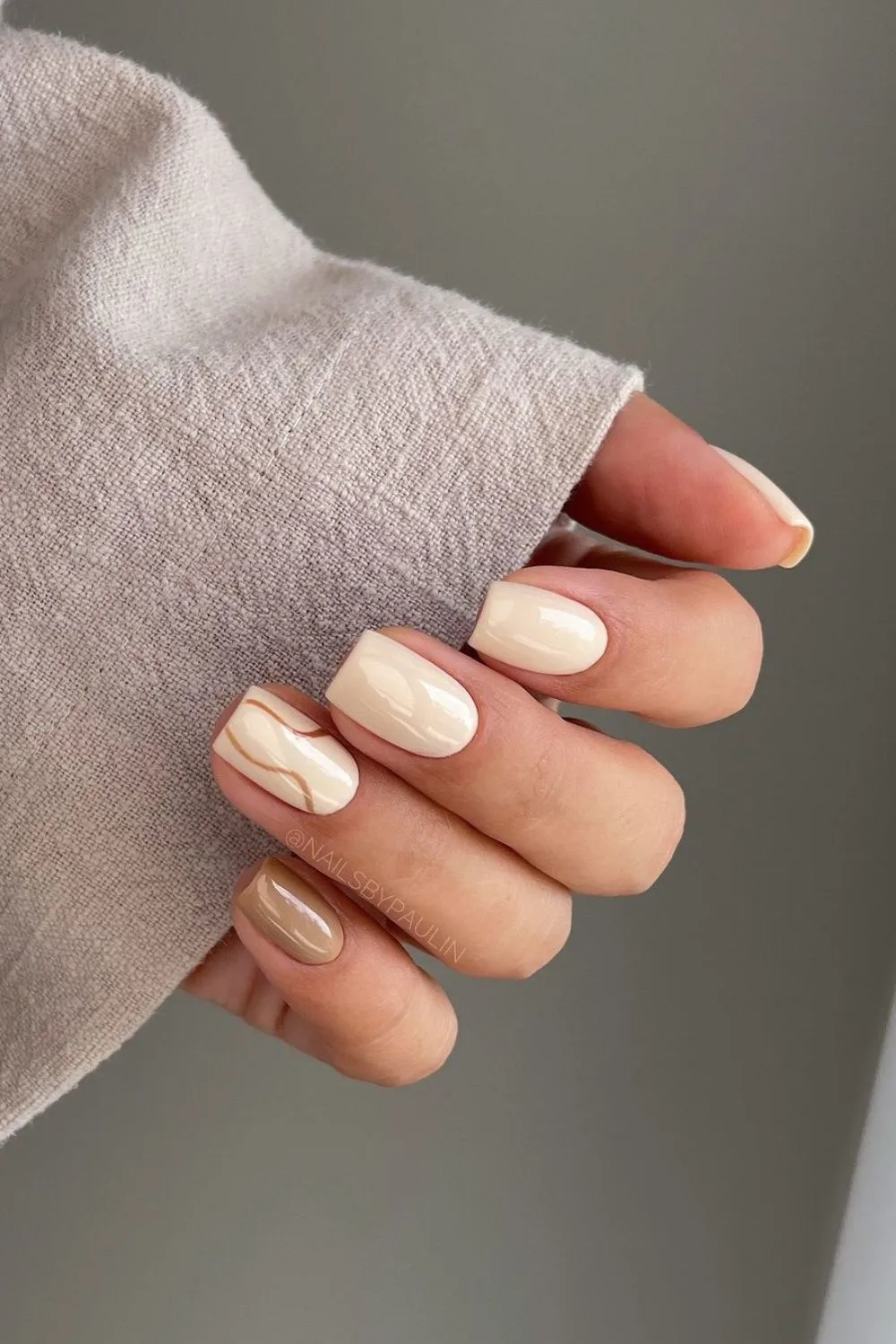 beige nails with brown accents