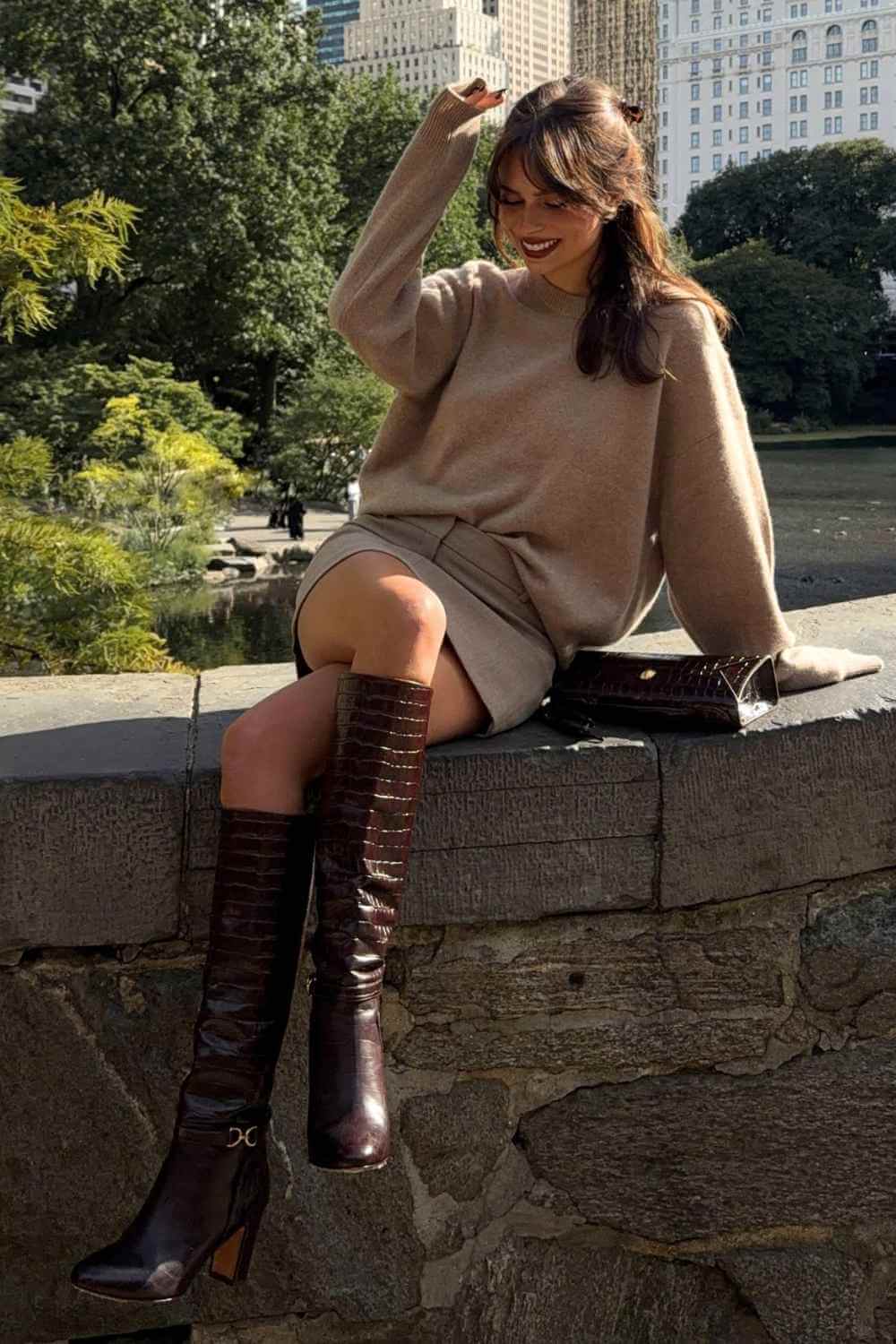 brown croc knee boots with oatmeal sweater and mini skirt