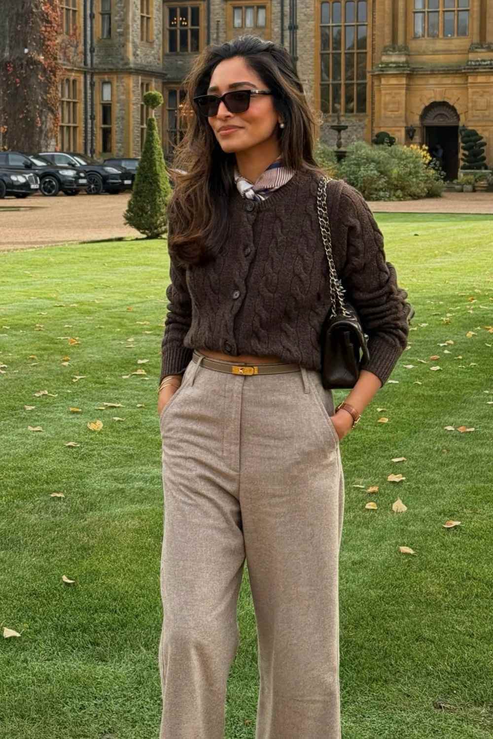 cable knit cardigan with silk scarf and tailored trousers