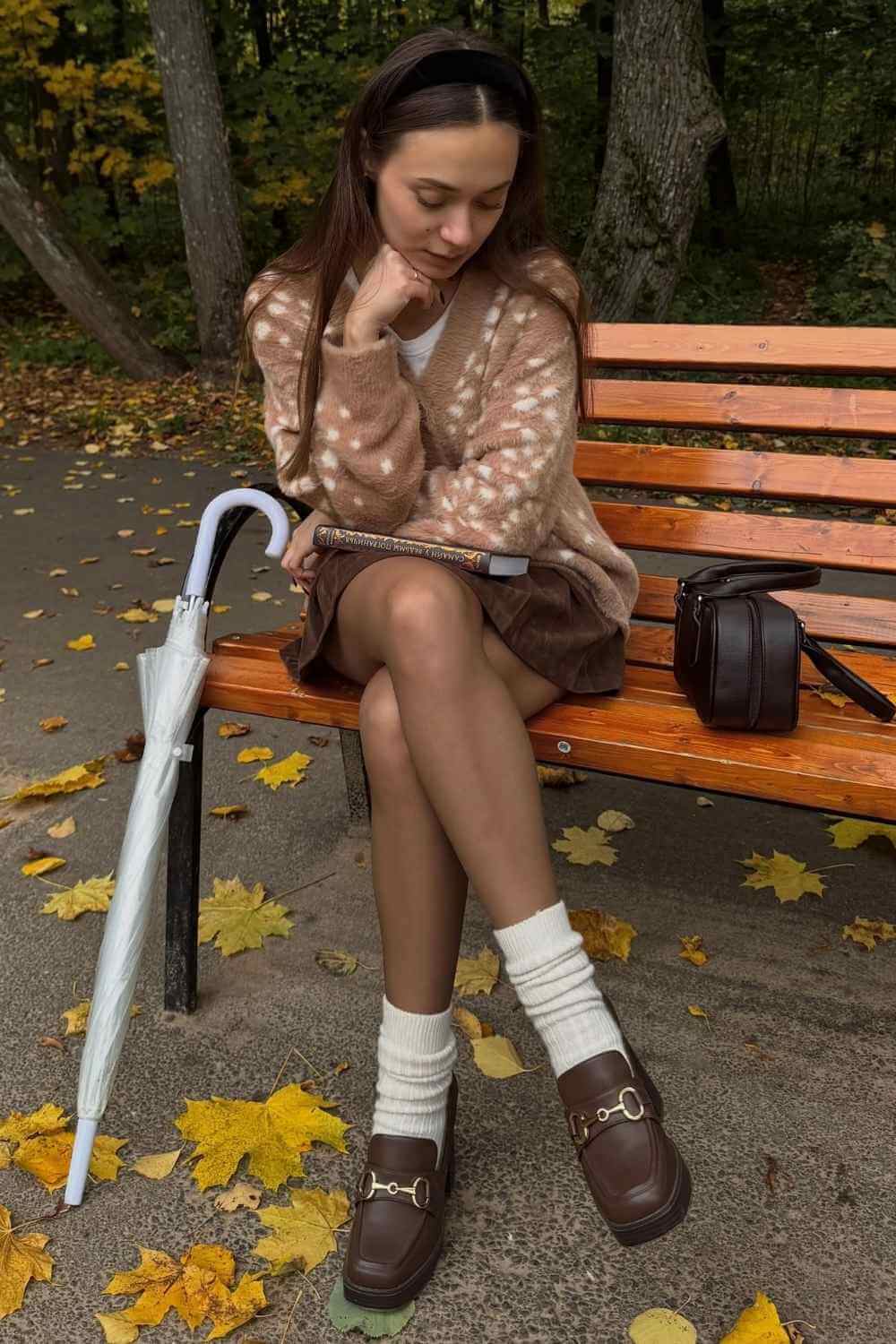 fawn print cardigan with brown mini skirt and loafers