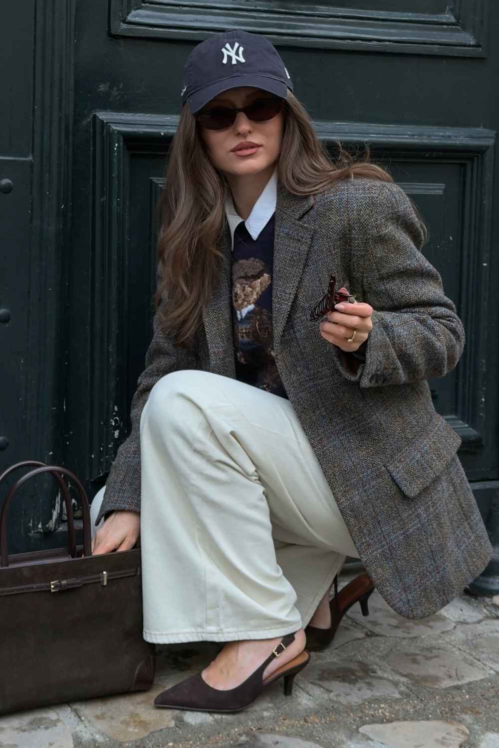 tweed blazer with baseball cap and cream pants